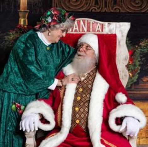 Santa and Mrs. Claus together at Santa's chair